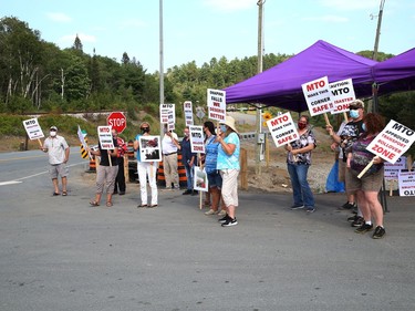 Onaping residents and supporters protest what they call a dangerous intersection on Highway 144 at Marina Road on Wednesday August 11, 2021. John Lappa/Sudbury Star/Postmedia Network
