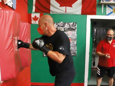 Sudbury MPP Jamie West competed in a series of physical challenges against Owen Paquette, 16, a Quest for Gold athlete, at Top Glove Boxing Academy in Sudbury, Ont. on Friday August 13, 2021. The Quest for Gold program is designed for athletes to achieve their goals. Paquette's goal is to represent Canada in the 2024 Olympic games. John Lappa/Sudbury Star/Postmedia Network
