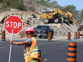 Roadwork continues on Long Lake Road in Sudbury, Ont. on Monday August 16, 2021. Work includes rock removal, asphalt replacement, drainage Improvements including ditching, guide rail installation and driveway entrance restoration. John Lappa/Sudbury Star/Postmedia Network