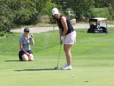Ali Catherwood putts on the first green at the Timberwolf Ladies' Open at Timberwolf Golf Club in Greater Sudbury, Ont. on Tuesday August 17, 2021. John Lappa/Sudbury Star/Postmedia Network