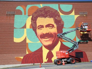 Kevin Ledo works on his mural of Alex Trebek at Sudbury Secondary School in Sudbury, Ont. for the Up Here urban art and music festival on Tuesday August 17, 2021. The festival runs from Aug. 20-22. John Lappa/Sudbury Star/Postmedia Network