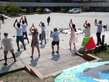 Participants take part in a dance at a rally at Tom Davies Square in Sudbury, Ont. on Friday August 20, 2021. Fridays For Future Youth joined forces with Save Laurentian University Greenspace, Save Wolf Lake, and the Sudbury Chapter of the International Physicians for the Prevention of Nuclear War, to mark the third anniversary of Greta Thunberg's first school strike for the climate. John Lappa/Sudbury Star/Postmedia Network