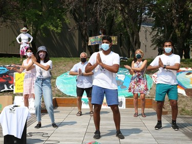 Arjun Shukla, middle, leads a dance at a rally at Tom Davies Square in Sudbury, Ont. on Friday August 20, 2021. Fridays For Future Youth joined forces with Save Laurentian University Greenspace, Save Wolf Lake, and the Sudbury Chapter of the International Physicians for the Prevention of Nuclear War, to mark the third anniversary of Greta Thunberg's first school strike for the climate. John Lappa/Sudbury Star/Postmedia Network