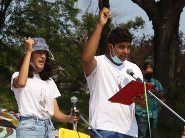 Climate activist Sophia Mathur and Arjun Shukla take part in a rally at Tom Davies Square in Sudbury, Ont. on Friday August 20, 2021. Fridays For Future Youth joined forces with Save Laurentian University Greenspace, Save Wolf Lake, and the Sudbury Chapter of the International Physicians for the Prevention of Nuclear War, to mark the third anniversary of Greta Thunberg's first school strike for the climate. John Lappa/Sudbury Star/Postmedia Network