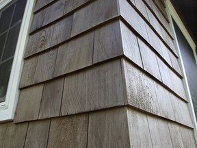 These eastern white cedar shingles would have weathered in a blotchy, ugly and uneven way if they had not been treated with a one-time darkening treatment. Steve Maxwell