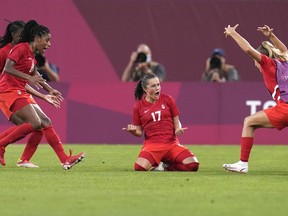 Canada's Jessie Fleming, 17, celebrates scoring the opening goal from the penalty spot during a women's semifinal soccer match against United States at the 2020 Summer Olympics, Monday, Aug. 2, 2021, in Kashima, Japan. Canada went on to win gold. Canada's women's soccer victory on Aug. 6 at the Olympic Games reflects the work being done at the grassroots, says the technical director of Sudburnia Soccer Club.