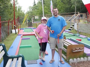 Mason Charbonneau, program and wellbeing coordinator with the Timmins Youth Wellness Hub, was with his daughter Ezra at Hollinger Park's Mini Putt on Friday to promote the variety of activities the hub is all set to host this summer. 

RICHA BHOSALE/The Daily Press
