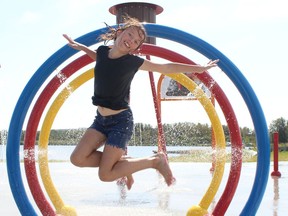 Chloe McAfee, 10, leaped at the opportunity to stay cool on a hot day during the last week of her summer holidays. She was spending some time at the splash pad at White Water Park in South Porcupine on Tuesday.