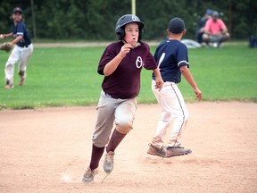 Tillsonburg Old Sox mosquito Kaden Weaver rounds second on his way to a triple against Chatham Sunday at the Optimist diamond. The Old Sox Otters won 13-8. (Chris Abbott/Norfolk and Tillsonburg News)