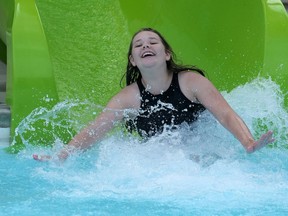 There were a lot of smiles at Lake Lisgar Water Park coming down the new 'twister' water slide in Tillsonburg. Ayla Hainer splashed into the pool several times Sunday afternoon. (Chris Abbott/Norfolk and Tillsonburg News)