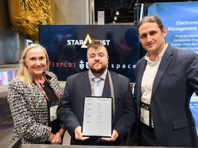 Julien Lamamy (right) Managing Director of ispace EU presents the signed MOU on a tablet along with Jason Michaud, CEO & President of Stardust Technologies, and Ann Bray (left), Minister Counsellor from the Embassy of Australia, United States of America. Not pictured, but also participating in the signing ceremony, included ispace Founder & CEO Takeshi Hakamada and Dr. Joshua Chou, Senior Lecturer at University of Technology Sydney and CEO of EXPLOR Space Technologies.