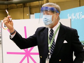 Dr. David Colby at the Chatham-Kent COVID-19 vaccination clinic at the John D. Bradley Convention Centre on Feb. 23, 2021. Mark Malone/Postmedia Network