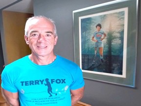 Brad Eggett wears the new Terry Fox t-shirt. The Fox family came together with Métis Nation BC to create the 2021 design, which celebrates Terry's heritage, which can be traced to his maternal grandmother, Mary Ann Gladue. Traditional Métis floral beading represent the flowers from the land on which his ancestors lived. Handout