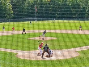 Fans watch Welland Jr. Jackfish pitch to St. Thomas Tomcats in championship ball on Sunday in St. Thomas at Emslie Field. The Tomcats won 5-2 to claim the Junior Intercounty Baseball Assoc. title.