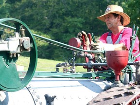 The Backus-Page House Museum is preparing for several events, including the Heritage Farm Show on Sept. 4 and 5. In this file photograph, Mark Clark prepared a threshing machine during the 2014 edition of the Heritage Farm Show. File photo/West Elgin Chronicle