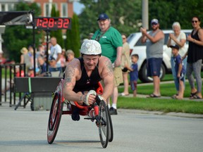 Josh Cassidy finishes a Paralympic wheelchair marathon qualifying race in Port Elgin on July 18. Cassidy was not selected for the Team Canada Paralympics athletics team, which will only bring nine male athletes to Tokyo for the 2020 Paralympic Games despite dozens of athletes qualifying. Rob Gowan/The Sun Times