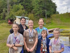 Some of these runners did both the 5k and 2.5k mud runs and earned two medals for their tremendous effort. Sabrina Desjardins, Jessica Niemi (front) Lola Roberts, Lillian Niemi, Jona Niemi and Aurora St. Pierre.