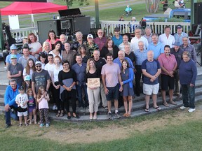 Family and friends of the late Mel Gardner gather on stage at the Riverwalk Amphitheatre in Pembroke for a group photo during a tribute night to the popular Ottawa Valley entertainer held on Sep. 1.