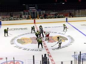 Players get ready at centre ice for the start of the last intrasquad game at the North Bay Battalion's training camp Thursday. The four-day gathering saw 25 participants emerge still vying for roster spots.