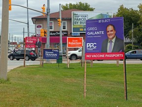 Federal election campaign signs are seen at the end of the overpass at Lakeshore Drive and Judge Avenue, Thursday. Michael Lee/The Nugget