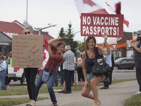 An anti-masking protest took place at the corner of Baseline Road and Broadway Boulevard Monday, August 30. On Thursday, Sept. 2, Elk Island Public Schools updated its masking policy to include all students, staff and visitors. Travis Dosser/News Staff