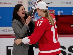 Ingersoll's Ella Shelton receives her gold medal after Canada defeated the U.S. in the women's world hockey final in Calgary.