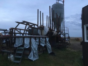 A view of the back end of Farkash's post-making machines. Melted plastic is pumped into the mold, and dunked into a water bath to cool it before removal. PHOTO SUBMITTED