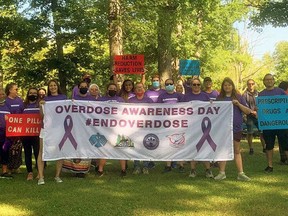 About 50 people marched in Chippewas of the Thames Aug. 31 as part of the international Overdose Awareness Day.