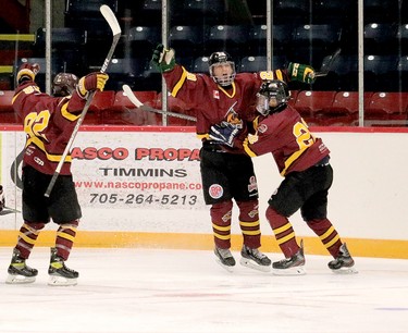 Timmins Rock forward Yan Bessette, centre, celebrates his second-period goal with teammates Nolan Ring, left, Aiden Farr during Friday night’s NOJHL exhibition contest against the Hearst Lumberjacks. The goal gave the Rock a 1-0 lead in a game they would go on to win 2-1. The two sides will play the second half of the home-and-home series in Hearst Sunday afternoon. ANDREW AUTIO/THE DAILY PRESS