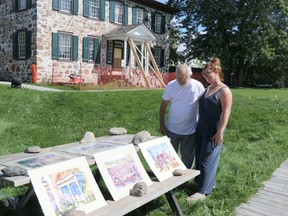 Doug Bradford and Cindy Hatt speak during their art sale at Ermatinger Clergue National Historic Site on Friday, Sept. 10, 2021 in Sault Ste. Marie, Ont. (BRIAN KELLY/THE SAULT STAR/POSTMEDIA NETWORK)