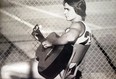 Ray Savignac often played guitar to pass the time between matches.
