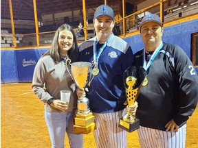 Micksburg Twins' pitcher Joran Graham won a gold medal at the European Fastball Championship with the Horsholm Hurricanes of Denmark. Graham (centre) holds the championship trophy while posing with his girlfriend Hailey Murray and his Danish coach Frode Lindtner.