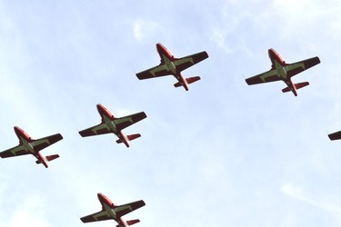 The Canadian Forces Snowbirds pass directly over the heads of the hundreds of area residents who turned out to watch them perform Wednesday. Galen Simmons/The Beacon Herald/Postmedia Network