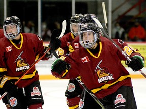Timmins Rock forward Christopher Engelbert, right, celebrates the first of his two second-period goals during Friday night’s 2021-22 NOJHL regular season opener at the McIntyre Arena. It was the first NOJHL goal for Engelbert, acquired by the Rock from the OJHL’s Cobourg Cougars on Tuesday. His second of the night was the game winner as the Rock went on to post a 7-3 victory over the visiting Kirkland Lake Gold Miners. THOMAS PERRY/THE DAILY PRESS