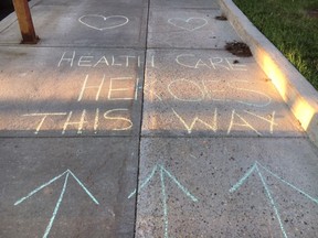 Strathcona Community Hospital health-care workers were reminded of the community's support for them this week as chalk messages appeared on the sidewalks and entranceways to the facility. Photos Supplied
