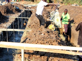 Workers in Chilumba, Malawi have begun laying down the foundation for the town's first library thanks to funding and project support from Stratford charity Change Her World, which has been helping promote education and literacy among girls and women in the region for the past decade. Submitted photo