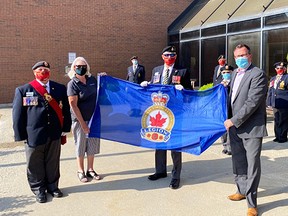 Handout/Chatham Daily News
Legion members and Municipality of Chatham-Kent officials gathered Friday to raise a flag for Legion Week that runs from Sunday to Friday. Pictured from left, is: Sergeant-At-Arms Len Drouillard, Chatham Coun. Karen Kirkwood-Whyte, Zone A3 Commander Len Maynard and Mayor Darrin Canniff.