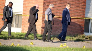 Special Investigations Unit investigates a shooting incident that left a man dead and a police officer seriously injured near 696 Pine St., in Sault Ste. Marie, Ont., on Sunday, Sept. 19, 2021. (BRIAN KELLY/THE SAULT STAR/POSTMEDIA NETWORK)