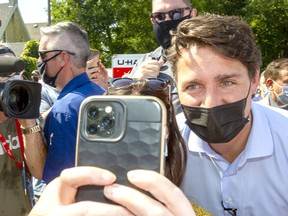 Hundreds of people waited for their chance for a selfie with Prime Minister Justin Trudeau during a campaign stop in London on Sept. 17. Mike Hensen/Postmedia Network