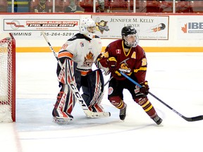 Timmins Rock forward Nicolas Pigeon, shown here cutting in front of Hearst Lumberjacks goalie Matteo Gennaro during the third period of an gam at the McIntyre Arena Sunday afternoon, is tied for the NOJHL scoring lead, with four points — all assists. Playing on line with captain Tyler Schwindt and Henry Brock, Pigeon will be looking to help the Rock continue their early season success when they take on the Crunch in Cochrane Saturday night and the Powassan Voodoos at the McIntyre Arena Sunday afternoon. THOMAS PERRY/THE DAILY PRESS