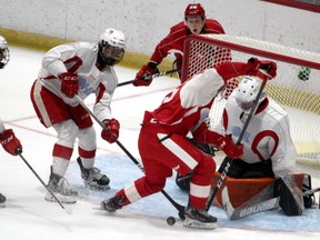 Soo Greyhounds goaltender Charlie Schenkel shows his skills during the Luke Williams Memorial Red & White game at GFL Memorial Gardens on Sept 3. Schenkel stopped 16 of 21 shots in the Greyhounds 5-1 home loss to the Sudbury Wolves in Ontario Hockey League exhibition action on Saturday night.