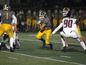 Korah Colts running back Ronan Provenzano finds a seam in the line of scrimmage and runs up-field during high school football action between the Colts and the St. Mary's Knights. The Colts went on to pick up their second win in as many games, with victory a 43-15 at John Faught Fieldhouse on Friday night.