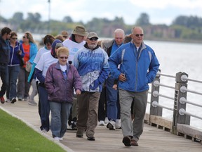 Kidney Walk participants make their way along the St. Mary's River boardwalk in Sault Ste. Marie, Ont., on Saturday, Sept. 13, 2014. (BRIAN KELLY/THE SAULT STAR/QMI AGENCY)