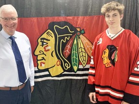 Mitchell Hawks' head coach Louie Livingston (left) welcomed into the fold Mitchell minor hockey product Seth Huygen earlier this month, as the pieces fall together for the Hawks prior to their 2021-22 PJHL season. Mitchell open the season in Kincardine Oct. 1 and are home to Hanover one night later at 7 p.m. ANDY BADER/MITCHELL ADVOCATE