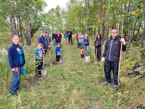 Local Cogeco employees and their families planted 50 trees on the property owned by the North Bay-Mattawa Conservation Authority and Friends of Laurier Woods on Old Callander Road. The local effort was done in partnership with Trees for Nipissing, the North Bay-Mattawa Conservation Authority and Friends of Laurier Woods. Submitted Photo