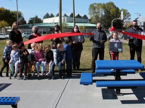 Kindergarten students from Norwood School were joined by representatives from the Austin Williamson Memorial Golf Tournament and legacy recipients to celebrate the final disbursement of the money raised by the golf tournament and cut the ribbon on Norwood's new outdoor classroom — the final disbursement of the Williamson legacy fund.