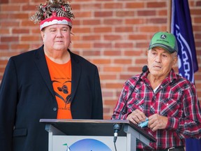 Mohawks of the Bay of Quinte Chief R. Donald Maracle, left, stood with residential school survivor Wilbert Maracle who recounted his life's journey Thursday at the Market square behind Belleville City hall for the first ever National Day for Truth and Reconciliation. ALEX FILIPE