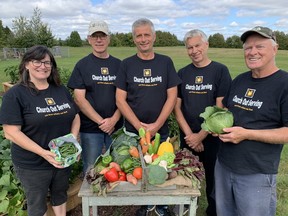 Church Out Serving reports a bumper harvest from a banner year of distributing fresh, healthy vegetables to local individuals and households in need. Volunteers helping make it happen include, from left, Virginia Lucas, Al Froese, Eric Haverkamp, Bert Stam and Tony Stam. – Monte Sonnenberg