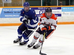 Greater Sudbury Cubs forward Cameron Shanks (7) pursues Soo Thunderbirds defenceman Kaden Dundas during first-period NOJHL action at Gerry McCrory Countryside Sports Complex in Sudbury, Ontario on Thursday, September 30, 2021.