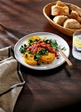 Prepared polenta is a true hidden gem of the supermarket — it's endlessly versatile and makes a great starting point for easy weeknight meals.